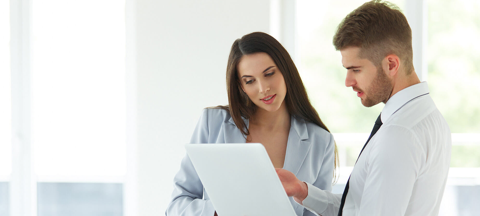Employees reviewing workplace resources